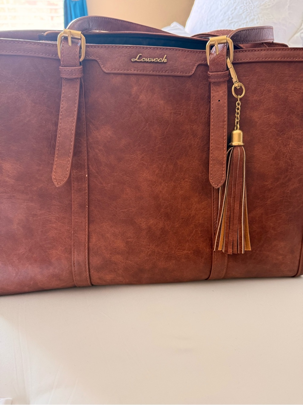 Structured Brown Tote with Tassel Charm and adjustable strap - Picture 9 of 10